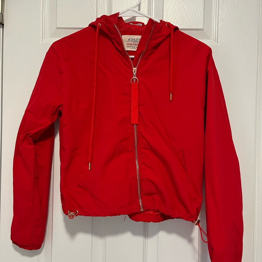 Red zip up raincoat